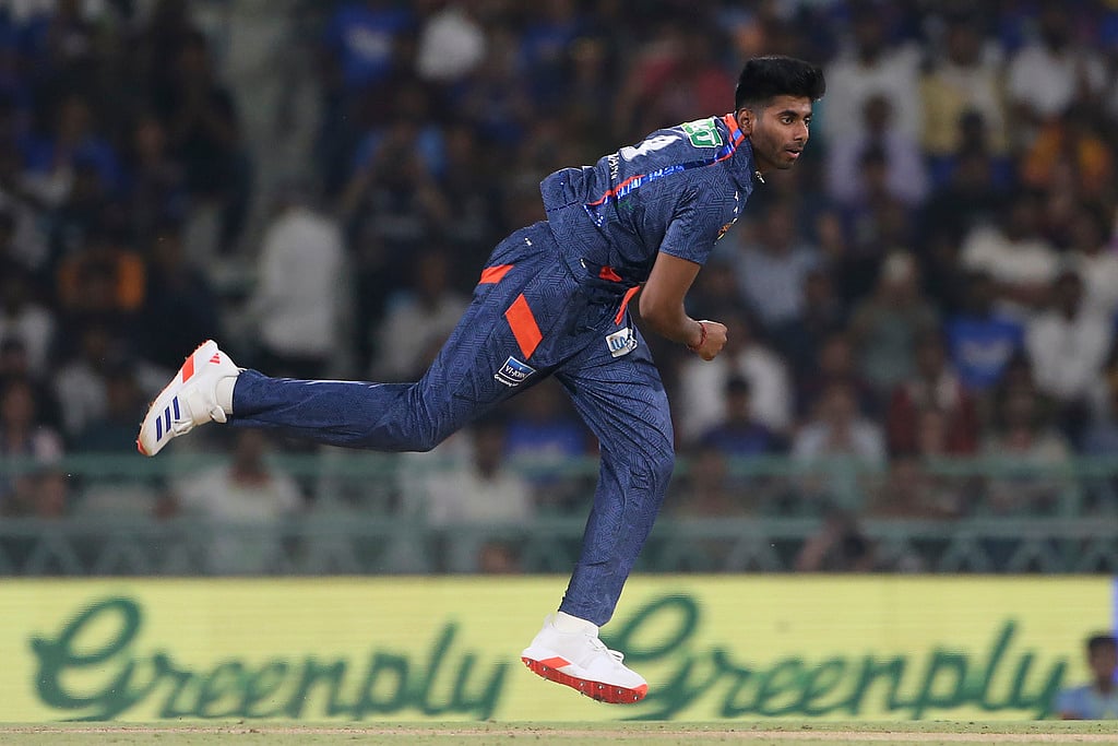 Lucknow Super Giants Mayank Yadav bowls a delivery during the Indian Premier League cricket match between Gujarat Titans and Lucknow Super Giants in Lucknow, India, Sunday, April 7, 2024. - (AP Photo/Surjeet Yadav)


