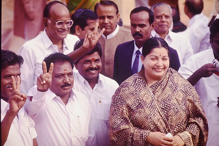 Tamil Nadu Chief Minister J Jayalalitha with All India Anna Dravida Munnetra Kazhagam (AIADMK) MP's after BJP-NDA government is sworn-in on on March 19, 1998 in forecourt of Rashtrapati Bhawan in New Delhi. - (Photo by Sondeep Shankar/Getty Images)