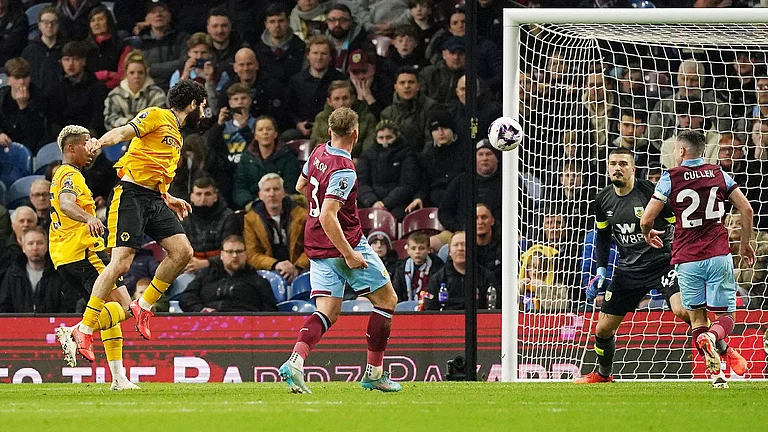 Rayan Ait-Nouri, second left scores Wolves’ equaliser against Burnley. - Photo: Martin Rickett/PA