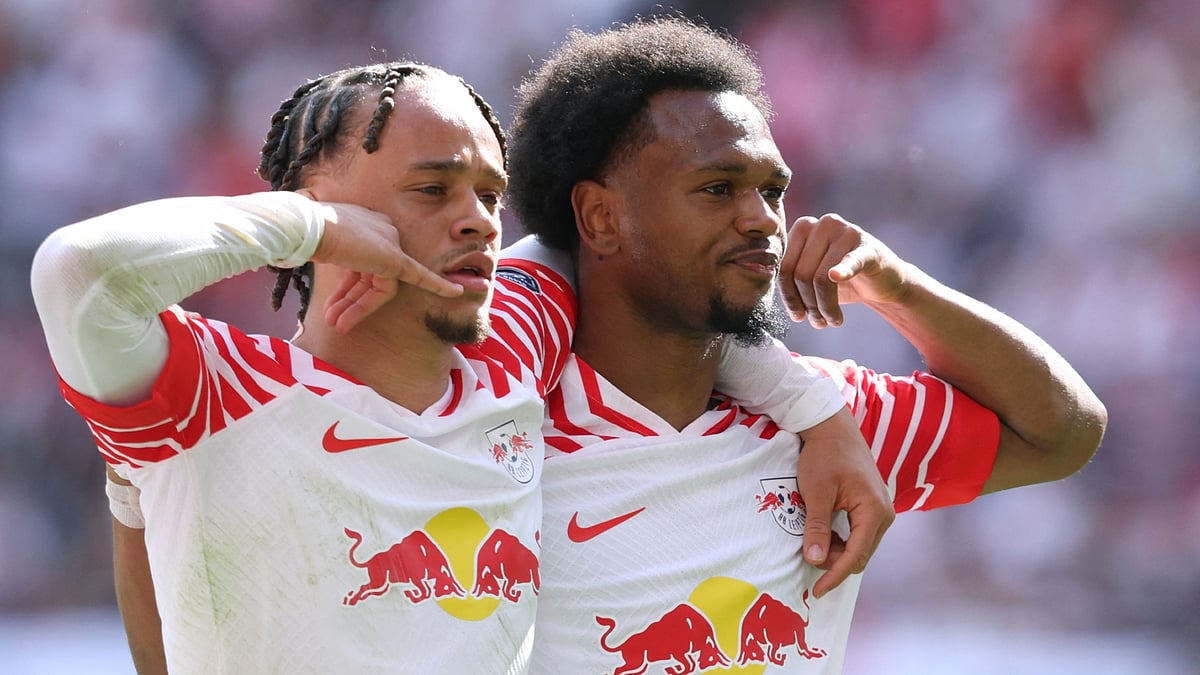 Xavi Simons and Lois Openda celebrate during RB Leipzig's win over Borussia Dortmund. - null