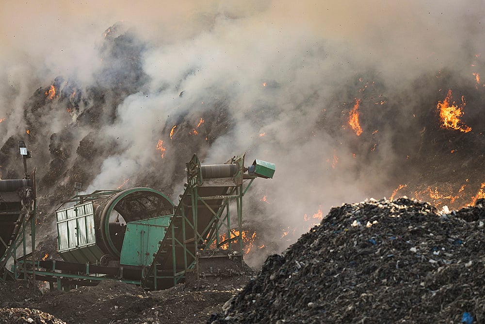 | Photo: PTI/Arun Sharma : Fire at Ghazipur landfill site: NGT seeks response