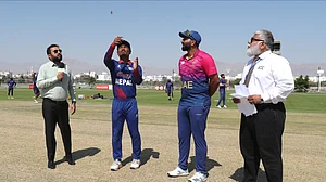 Photo: X/ @CricketNep : Nepal and UAE captain during the toss of the 1st semifinal match in the ACC Men's T20I Premier Cup 2024 in Al Amerat.