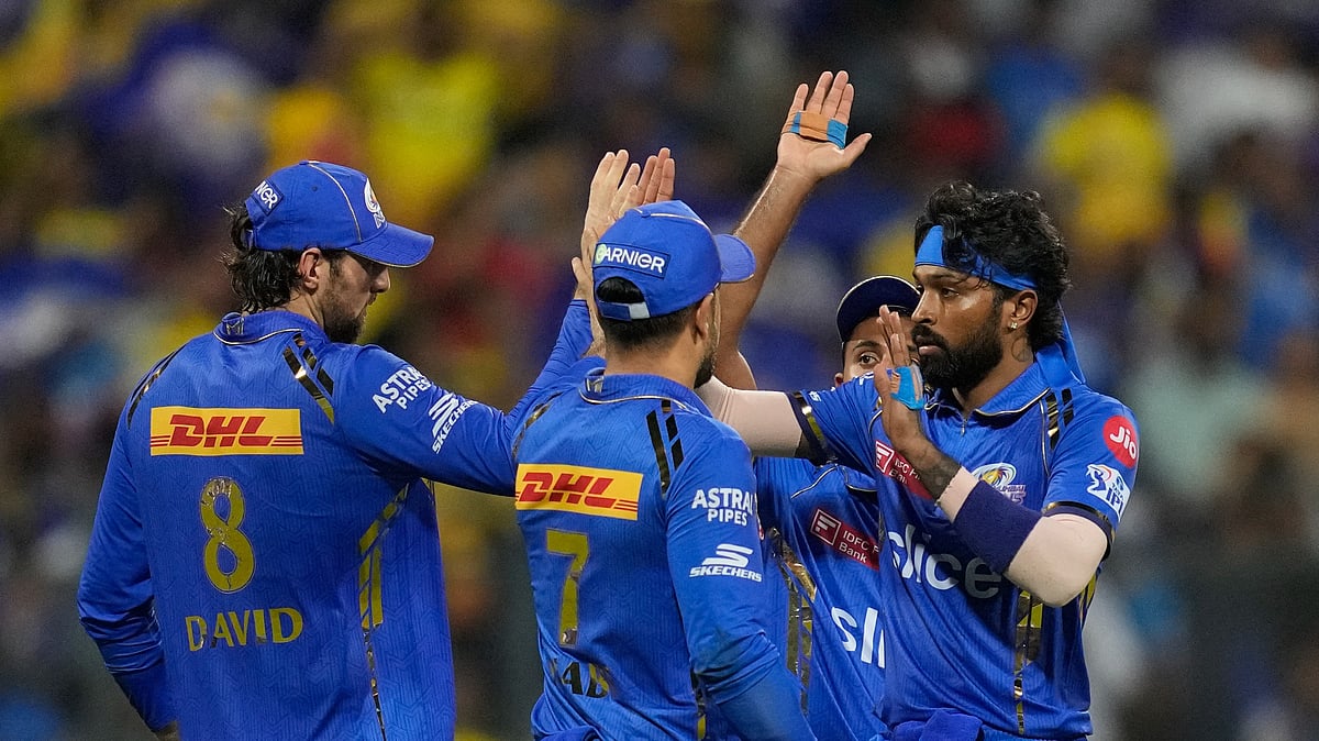 Mumbai Indians' captain Hardik Pandya, right, celebrates the wicket of Chennai Super Kings' captain Ruturaj Gaikwad during the Indian Premier League cricket match between Mumbai Indians and Chennai Super Kings in Mumbai. - AP Photo/ Rafiq Maqbool