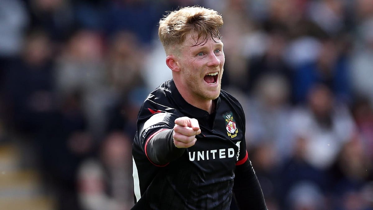 Barrington Coombs/PA : Andy Cannon celebrates scoring Wrexham’s third goal.