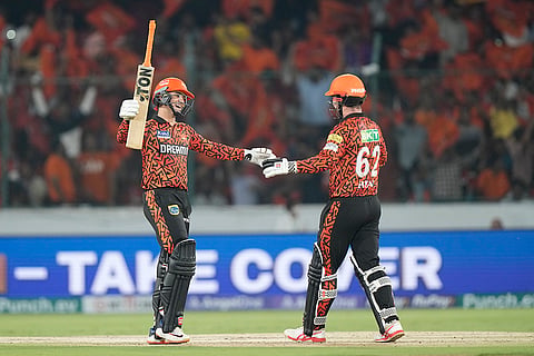 SRH's Abhishek Sharma, left, celebrates his fifty