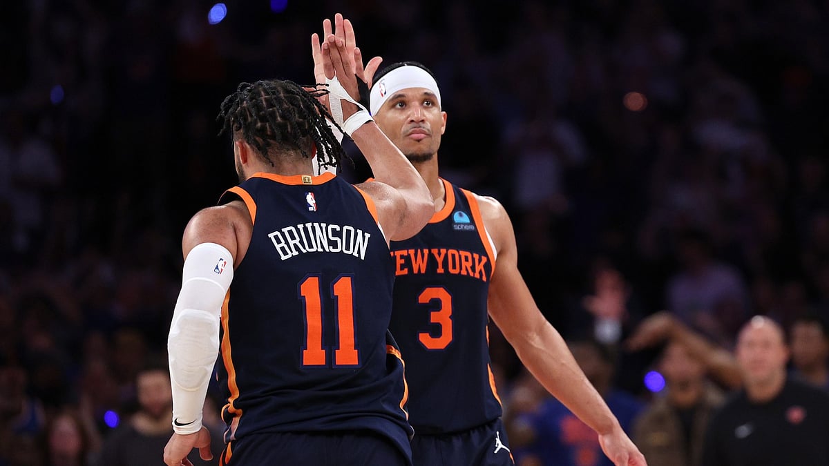 Jalen Brunson #11 high fives Josh Hart #3 of the New York Knicks after Game Two of the Eastern Conference Second Round Playoffs against the Indiana Pacers at Madison Square Garden on May 08, 2024 in New York City. - null