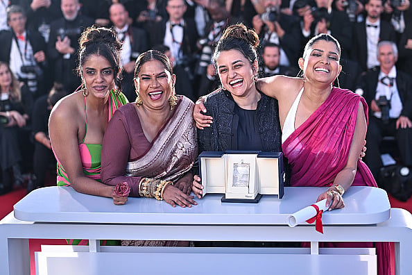 Getty Images : Kani Kusruti, Chhaya Kadam, Payal Kapadia and Divya Prabha pose with the Grand Prix Award