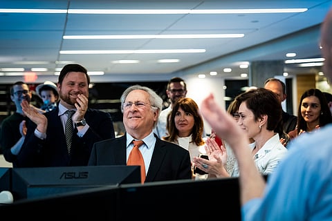David Hoffman is applauded as he wins the Pulitzer Prize for Editorial Writing with the staff of The Washington Post during a newsroom gathering in Washington, Monday, May 6, 2024.