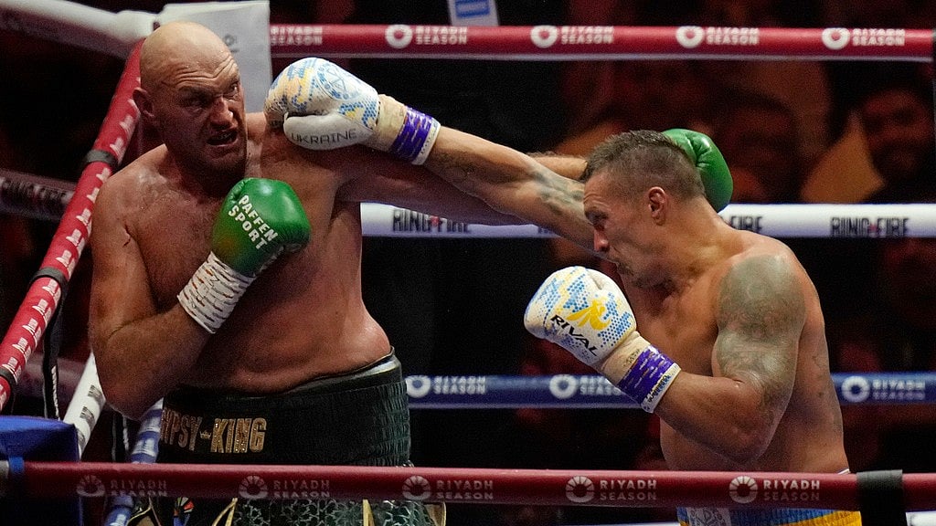 Oleksandr Usyk defeated Tyson Fury by split decision to become the first undisputed heavyweight boxing champion in 24 years. - AP/Francisco Seco
