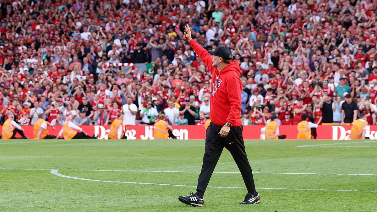 Jurgen Klopp waves goodbye to his Anfield faithful on Sunday.