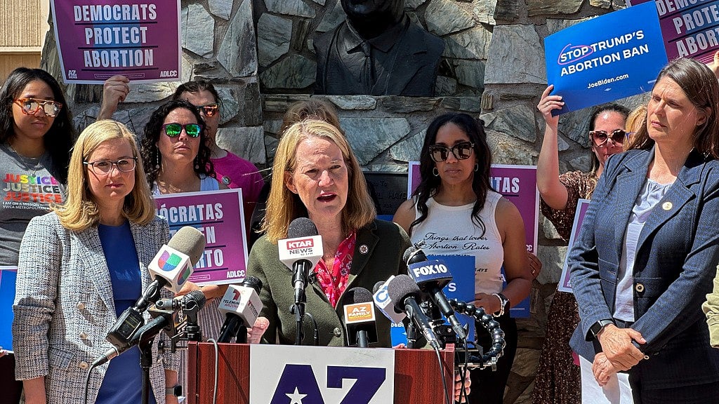 AP : Arizona Attorney General Kris Mayes speaks to reporters at the state Capitol in Phoenix, April 9, 2024.