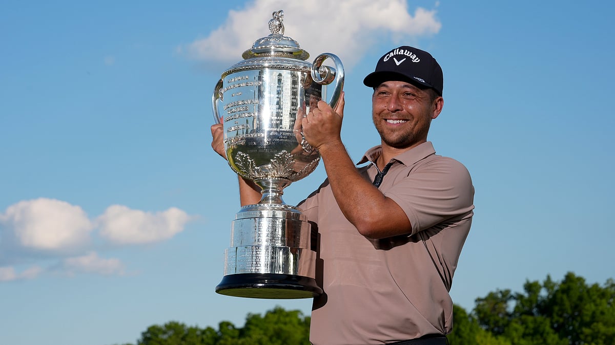 Xander Schauffele holds the Wanamaker trophy after winning the PGA Championship golf tournament at the Valhalla Golf Club. - AP