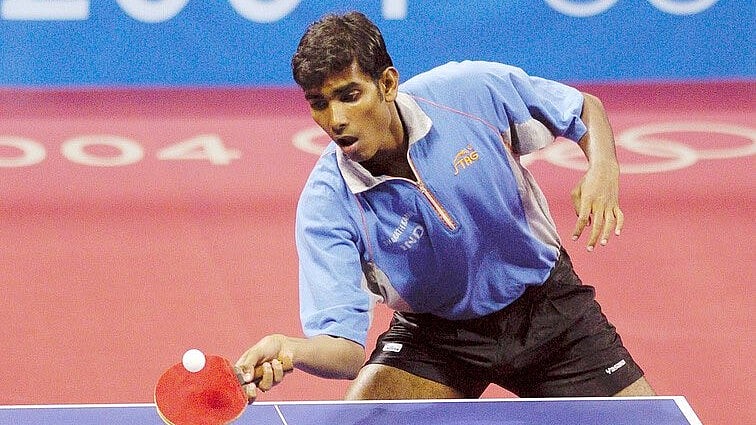 Sharath Kamal playing table tennis in the Athens Olympics in 2004. - Photo: X/ @sharathkamal1