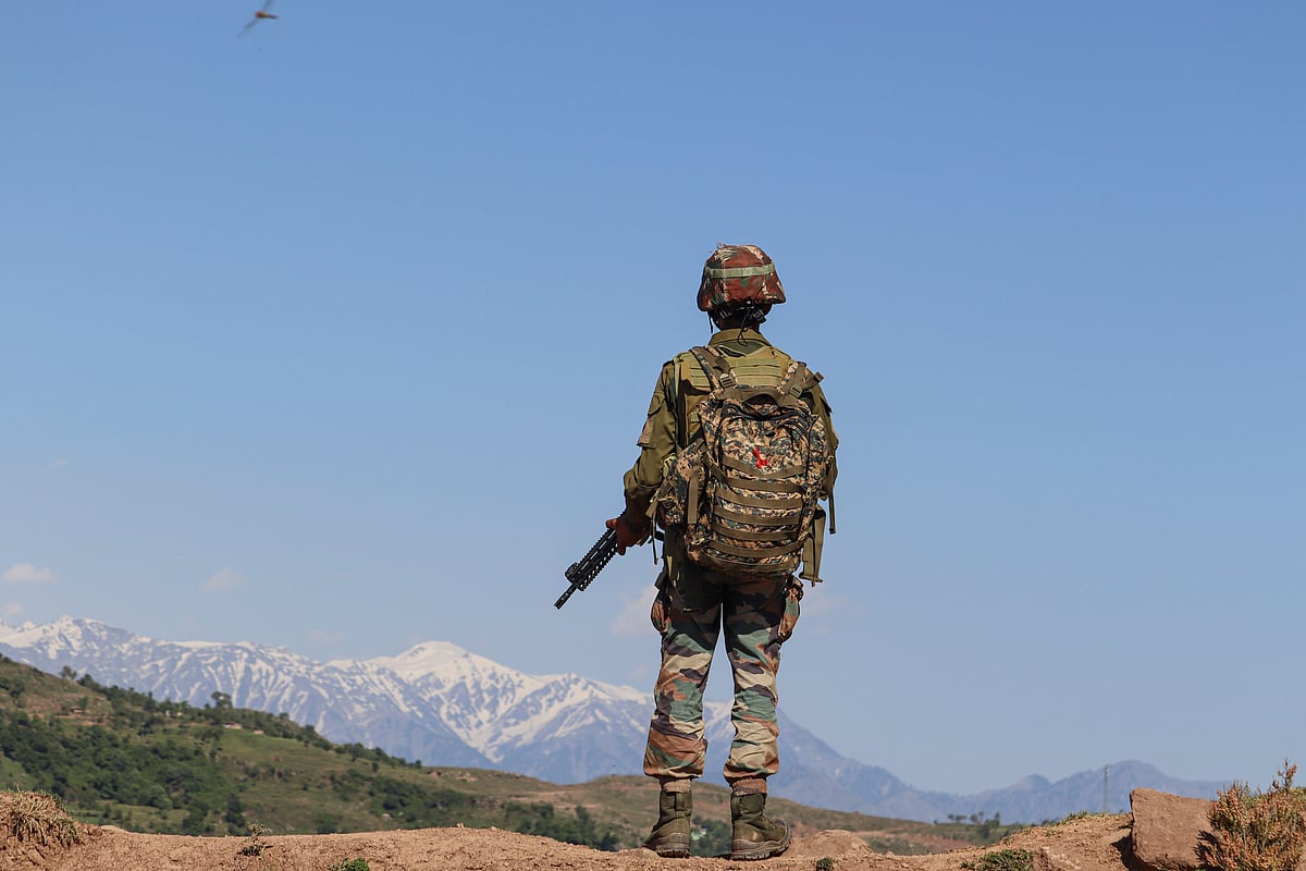 PTI : An Indian Army soldier stands guard near the Line of Control (LoC), in Poonch district of Jammu & Kashmir