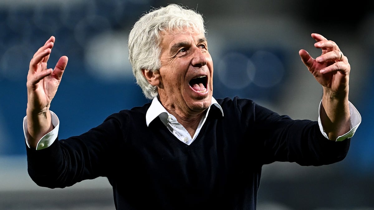 Gian Piero Gasperini celebrates Atalanta's win over Roma.