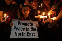 Getty Images : Demonstrators carry out a candle light protest over sexual assault case of two Kuki women, during ongoing ethnic clashes in Manipur.