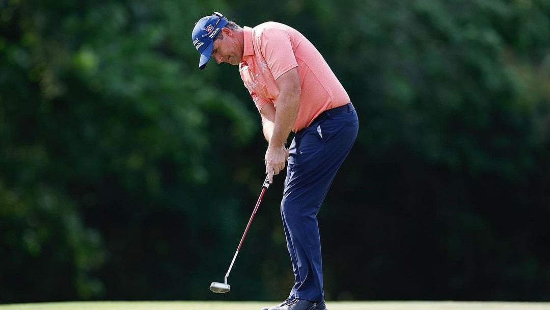 Padraig Harrington and Chris DiMarco shared the lead Thursday at the Regions Tradition 