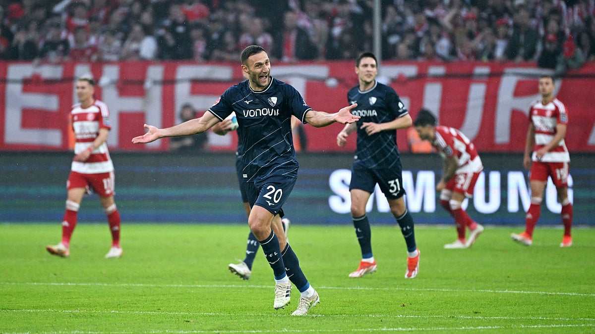 Bochum celebrate after securing Bundesliga survival on Monday
