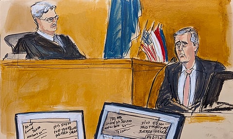 Michael Cohen, left, testifies on the witness stand in Manhattan criminal court about the calculations that Alan Weisselberg made to determine how to pay back Cohen for the money he paid to Stormy Daniels, Monday, May 13, 2024, in New York. 