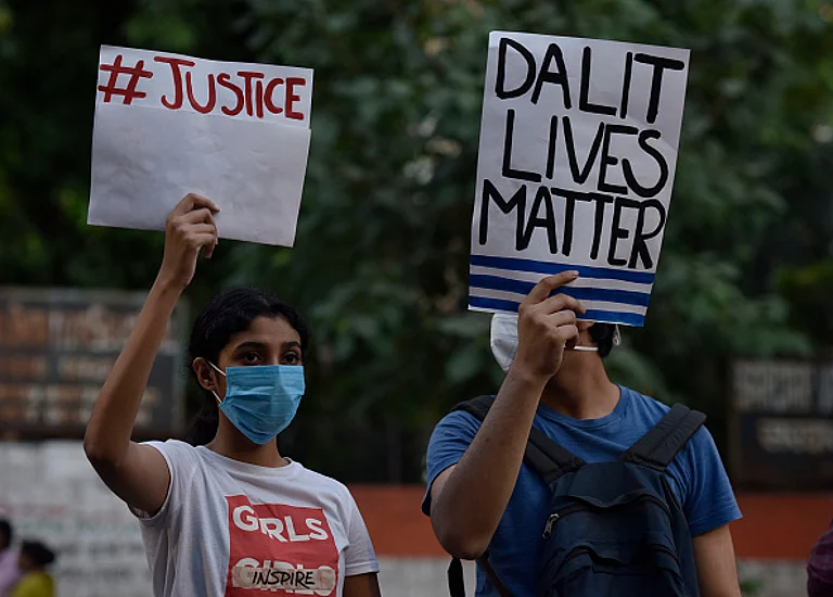People with placards demonstrate against the Hathras incident and crimes against women, at Jantar Mantar. - Getty Images