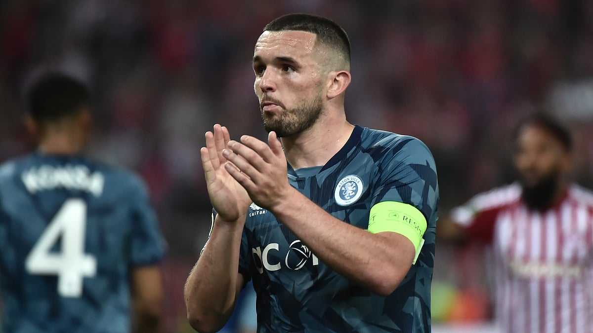 John McGinn applauds Aston Villa's travelling fans after Thursday's game