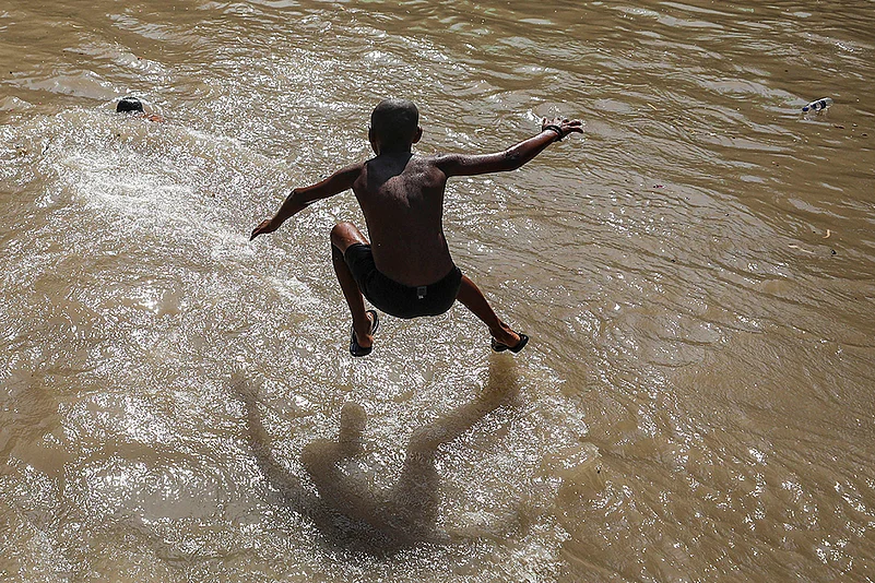 Heatwave: Boy cools off in Jammu