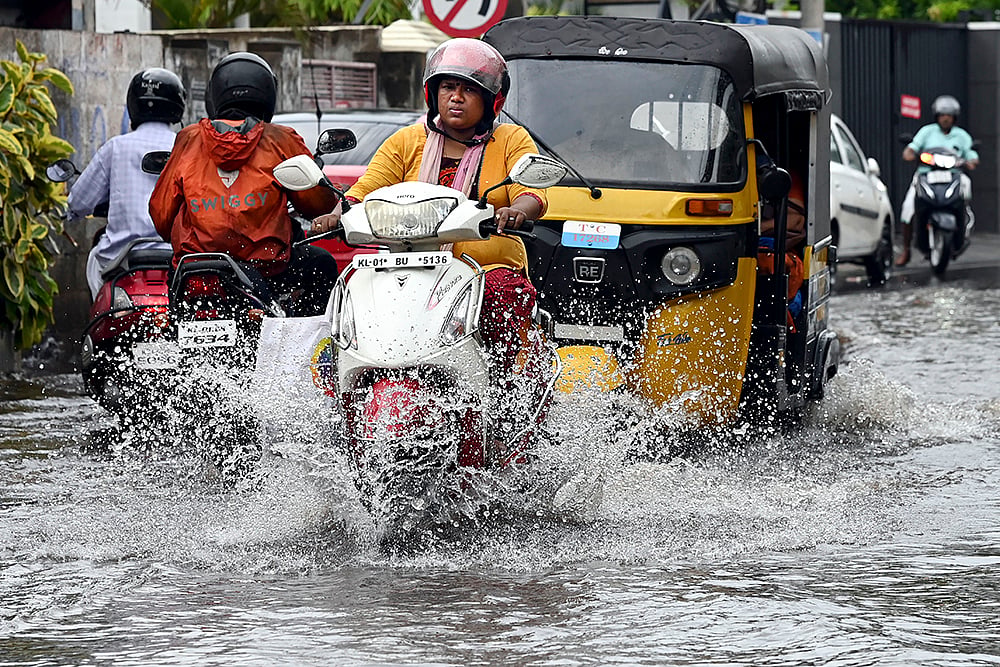 | Photo: PTI : Weather: Rain in Trivandrum