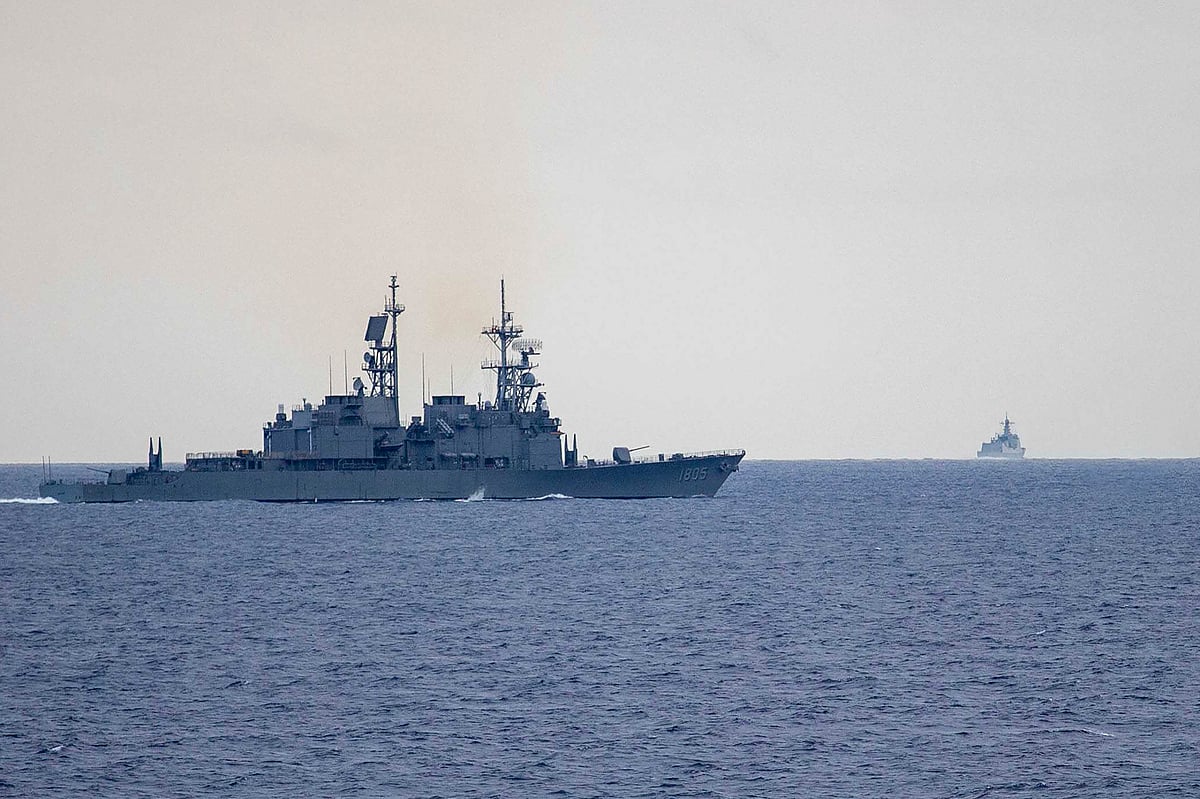 AP : Taiwanese guided missile destroyers monitoring that of China's. 
