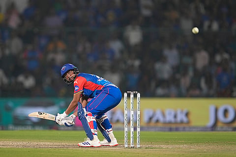 DCs' Kuldeep Yadav plays a shot 