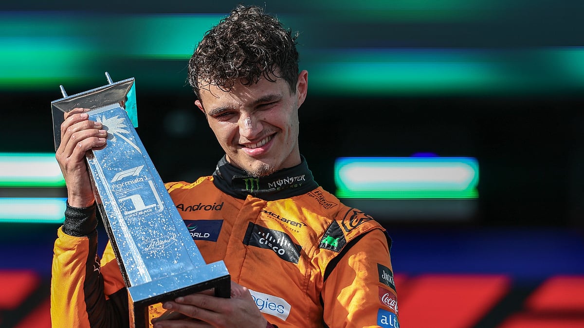 Lando Norris celebrates his first Formula One race win.