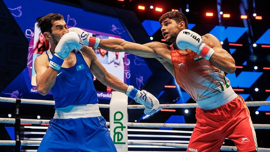 BFI : Nishant Dev (Red) was clinical in his 5-0 demolition of Thailand’s Peerapat Yeasungnoen.