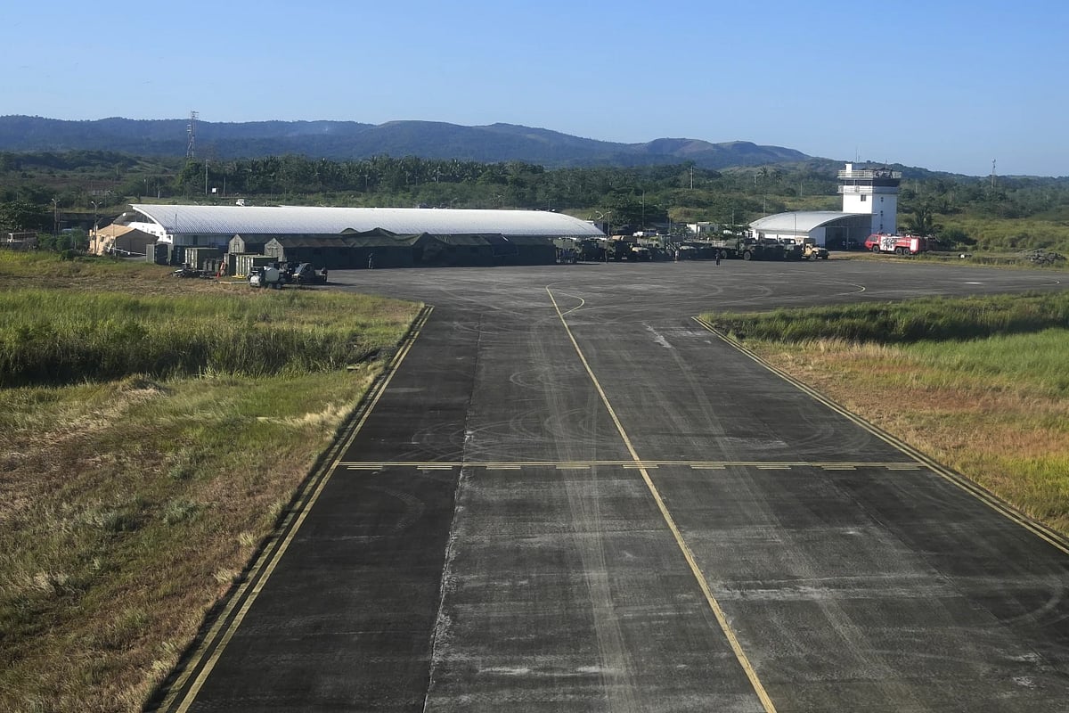 AP : US military vehicles are parked at LaL-lo Airport in Phillipines |