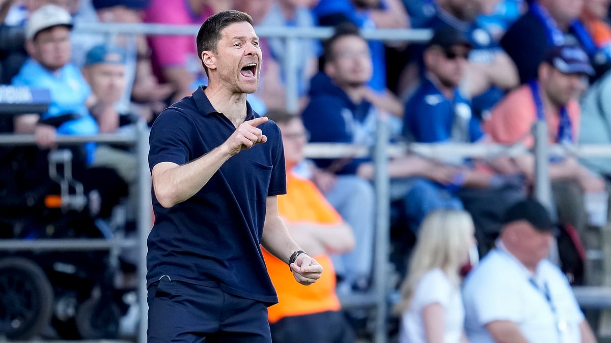 Xabi Alonso has one more Bundesliga game to keep Bayer Leverkusen unbeaten throughout the whole season. - null