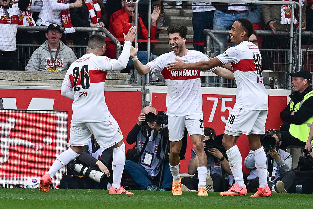 Stuttgarts Deniz Undav, scorer Leonidas Stergiou and Jamie Leweling celebrate the first goal 