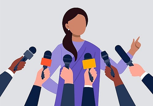An indian woman giving an interview to the media