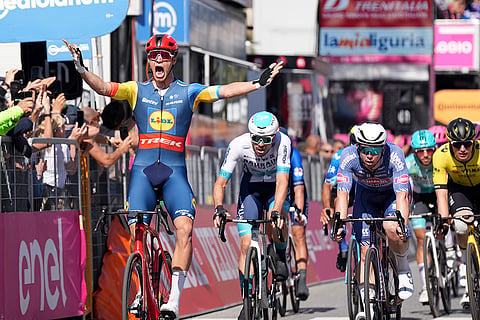 Jonathan Milan celebrates 4th stage race