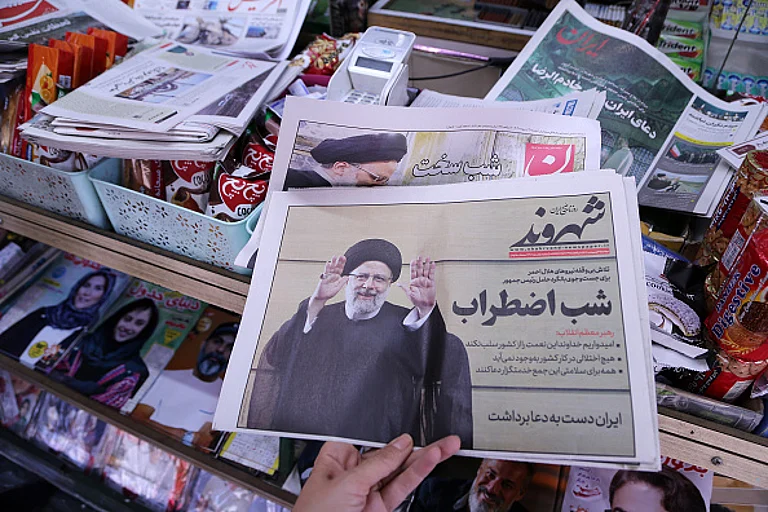 Newspapers cover the death of Iranian President Ebrahim Raisi in a helicopter crash on their headlines in the country's press in Tehran, Iran on May 20, 2024. - null