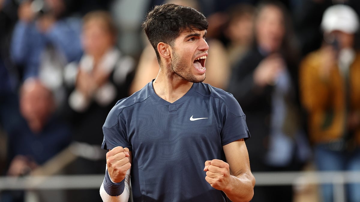 Carlos Alcaraz celebrates his win over Jesper de Jong.