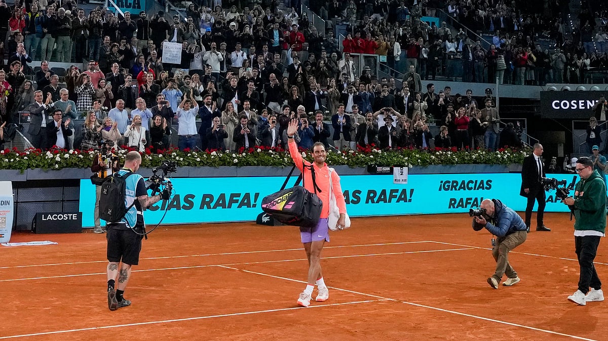 Manu Fernandez/AP : Rafael Nadal, center, waves to the crowd after losing his Madrid Open 2024 match against Jiri Lehecka in Madrid, Spain on April 30, 2024.