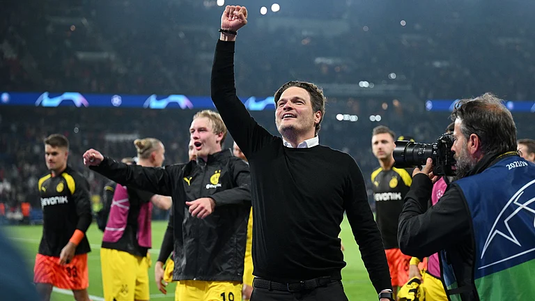 Terzic celebrates after guiding Dortmund to the Champions League final. - null