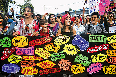 Participants at a parade march