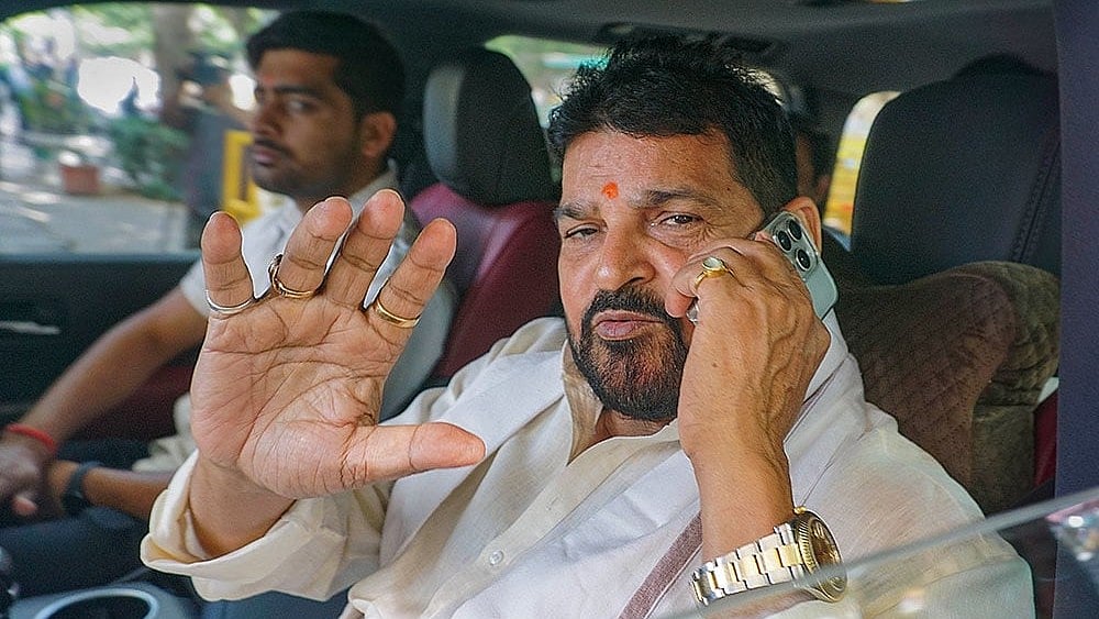 Photo: PTI : Brij Bhushan at Rouse Avenue Court