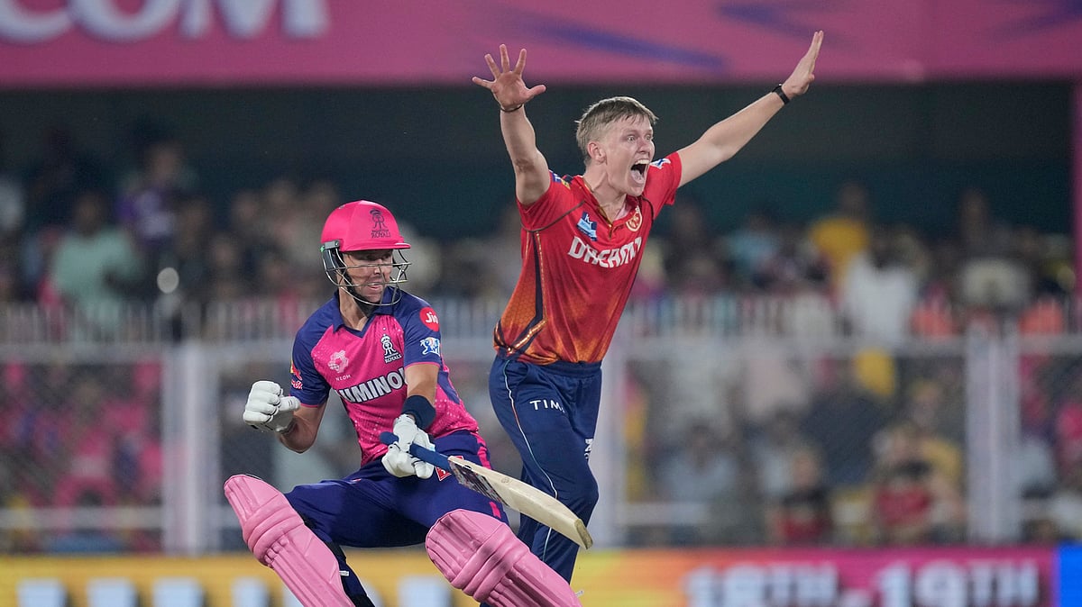 Punjab Kings' Nathan Ellis unsuccessfully appeals for the wicket of Rajasthan Royals' Trent Boult during the Indian Premier League cricket match between Rajasthan Royals and Punjab Kings in Guwahati, India, Wednesday, May. 15, 2023. 
 - (AP Photo/Anupam Nath)
