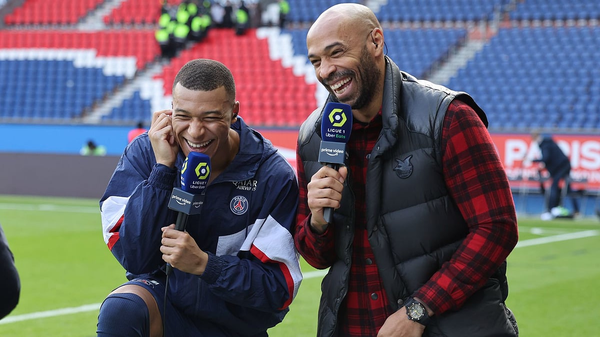 Mbappe and Henry (pictured in 2023). - null