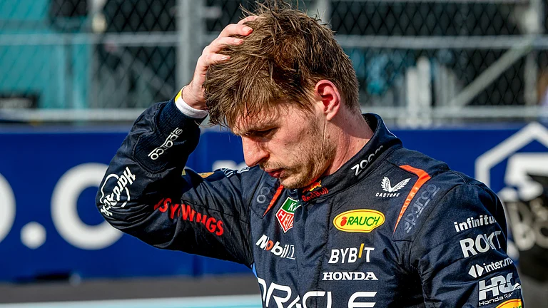 Max Verstappen has been linked with a move to Mercedes. - null