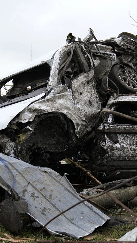 Destroyed Cars Piled Up After The Tornado 