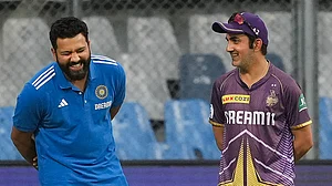 PTI/Kunal Patil : Rohit Sharma with Gautam Gambhir ahead of the MIvs KKR match