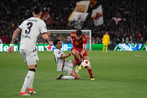 Paulo Dybala, right, is challenged by Amine Adli