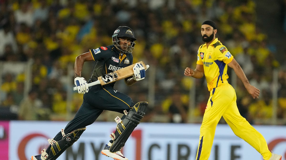 AP Photo/Ajit Solanki : Gujarat Titans' Sai Sudharsan take run as Chennai Super Kings' Simarjeet Singh watches during the Indian Premier League cricket match between Gujarat Titans and Chennai Super Kings in Ahmedabad.
