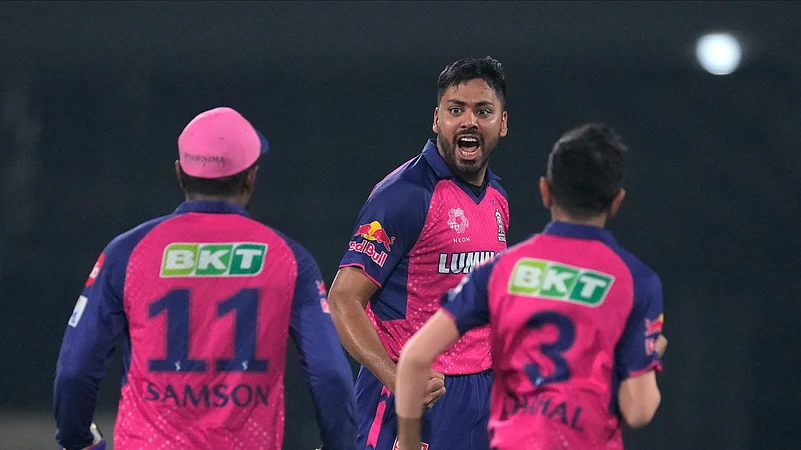 Avesh Khan and Sanju Samson in IPL 2024. AP Photo